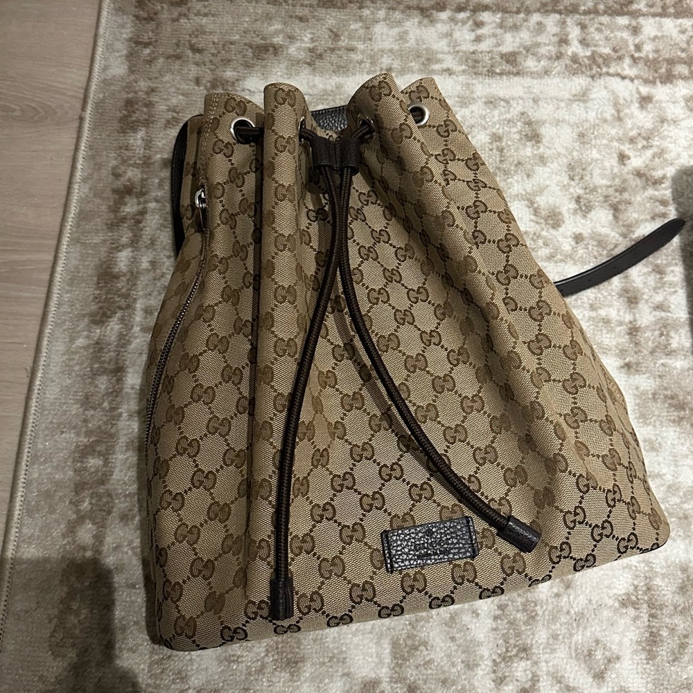 Gucci Monogram Drawstring Backpack
